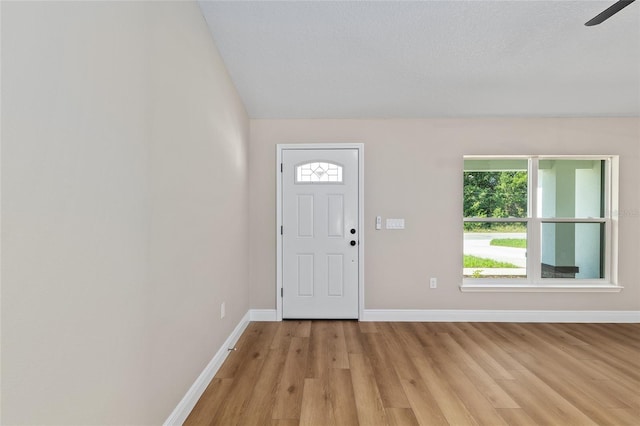 8293 SE 158th St, Summerfield, FL 34491 - foyer with baseboards and plenty of natural light