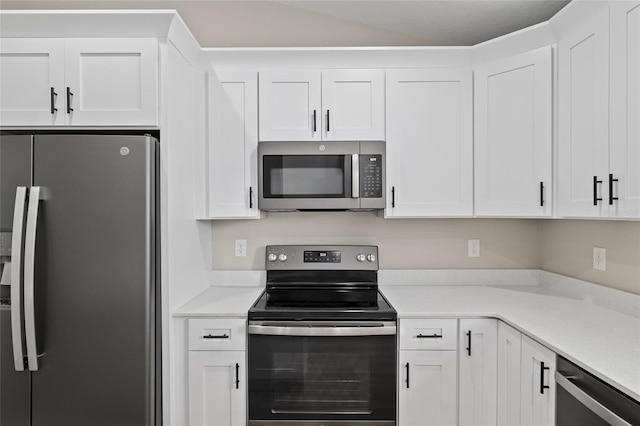 8293 SE 158th St, Summerfield, FL 34491 - kitchen featuring appliances with stainless steel finishes and white cabinetry