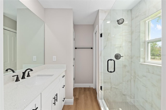 8293 SE 158th St, Summerfield, FL 34491 - full bath featuring vanity, a shower stall, wood finished floors, and baseboards