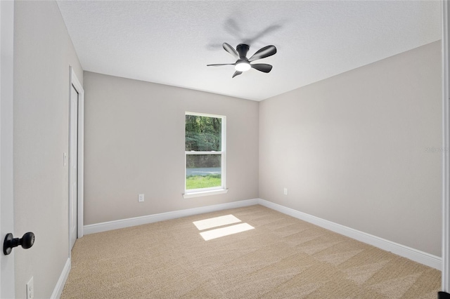 8293 SE 158th St, Summerfield, FL 34491 - empty room with light carpet, ceiling fan, and baseboards