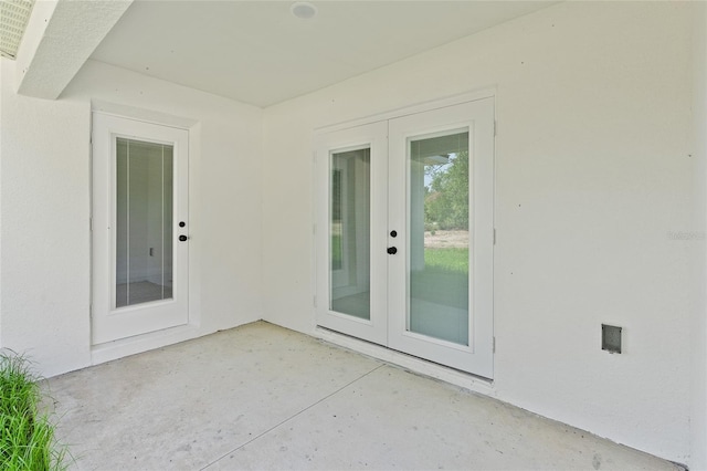 8293 SE 158th St, Summerfield, FL 34491 - property entrance featuring a patio and stucco siding