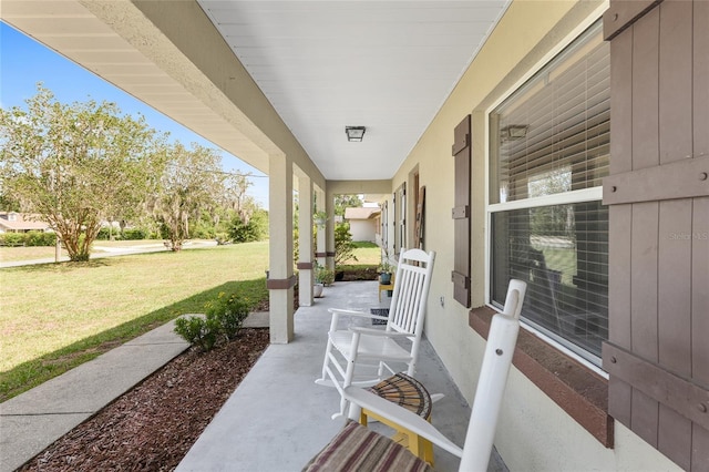 1601 NE 47th Ct, Ocala, FL 34470 - covered porch with a lawn