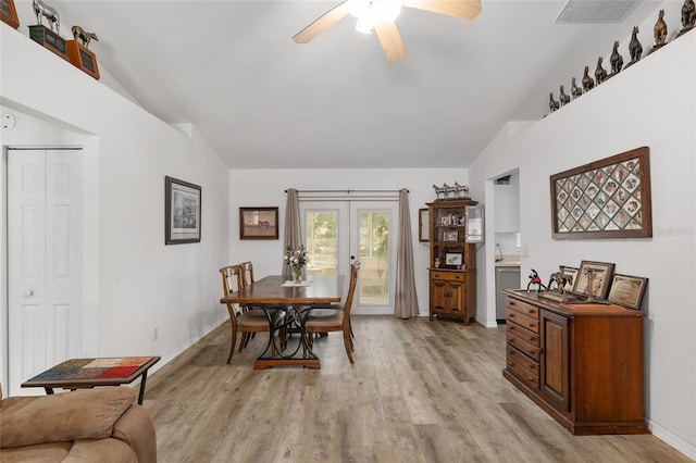 1601 NE 47th Ct, Ocala, FL 34470 - dining space featuring lofted ceiling, a ceiling fan, light wood-style floors, baseboards, and french doors