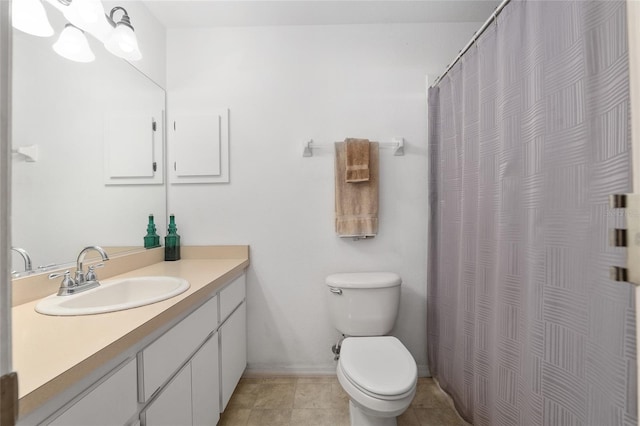 1601 NE 47th Ct, Ocala, FL 34470 - bathroom with vanity, toilet, baseboards, and a shower with curtain
