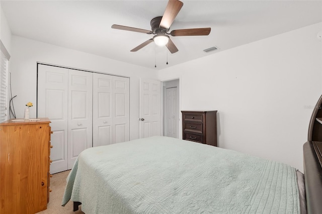 1601 NE 47th Ct, Ocala, FL 34470 - bedroom featuring a closet, carpet floors, and ceiling fan