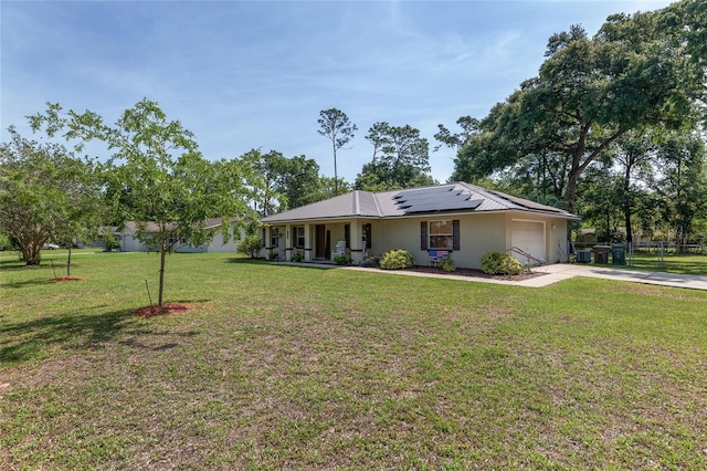 1601 NE 47th Ct, Ocala, FL 34470 - single story home featuring concrete driveway, a garage, roof mounted solar panels, stucco siding, and a porch