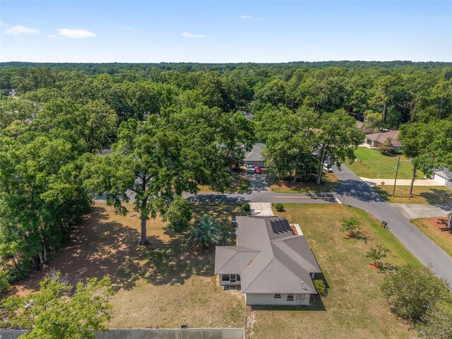 1601 NE 47th Ct, Ocala, FL 34470 - view from above of property with a heavily wooded area