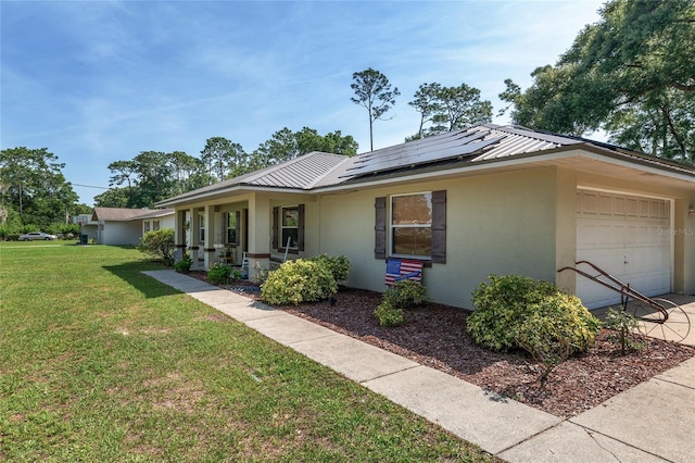 1601 NE 47th Ct, Ocala, FL 34470 - view of side of home featuring stucco siding, an attached garage, solar panels, a yard, and metal roof
