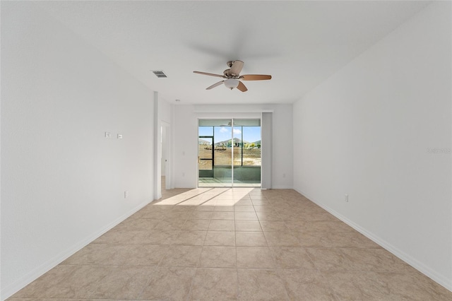 10277 SW 96th Loop, Ocala, FL 34481 - unfurnished room featuring a ceiling fan, baseboards, and light tile patterned flooring