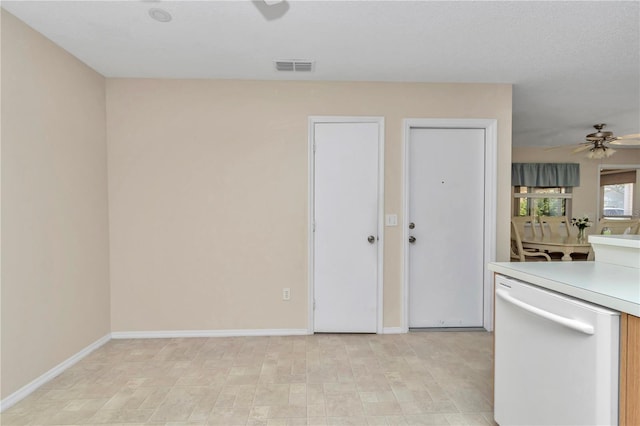 2608 Botello Ave, The Villages, FL 32162 - kitchen featuring dishwasher, a ceiling fan, light countertops, and baseboards