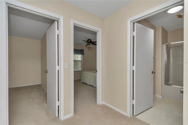 2608 Botello Ave, The Villages, FL 32162 - hall with light colored carpet and baseboards