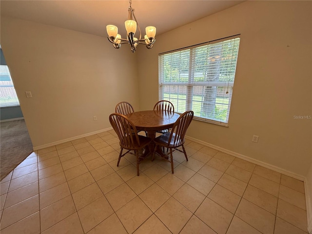 206 SE 8th Ave, Williston, FL 32696 - dining space featuring a chandelier and light tile patterned floors