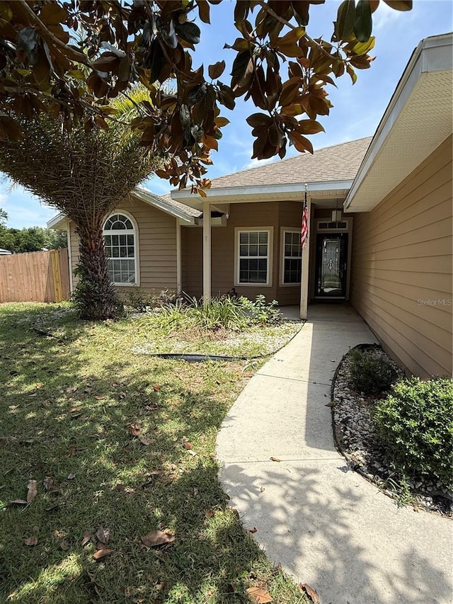 206 SE 8th Ave, Williston, FL 32696 - entrance to property featuring roof with shingles