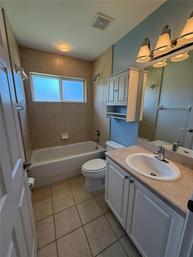 206 SE 8th Ave, Williston, FL 32696 - full bathroom with vanity, tile patterned floors, and  shower combination