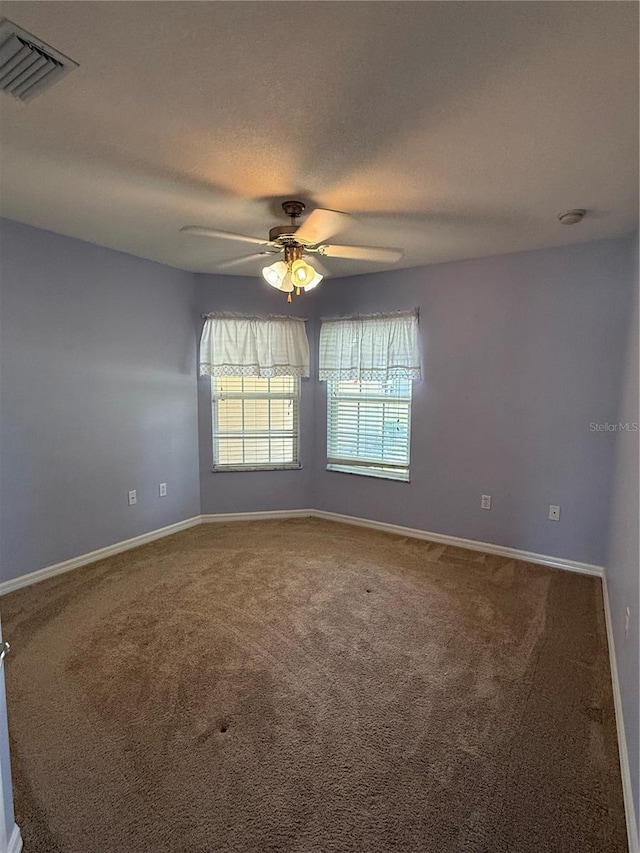 206 SE 8th Ave, Williston, FL 32696 - unfurnished room featuring ceiling fan and carpet flooring