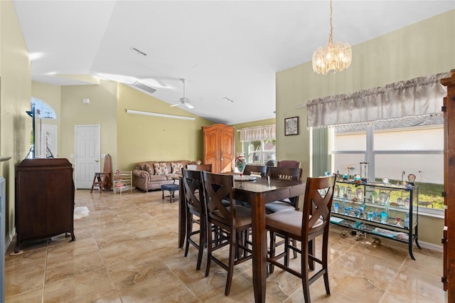 10468 S Drew Bryant Cir, Floral City, FL 34436 - dining space with lofted ceiling, a chandelier, and a ceiling fan