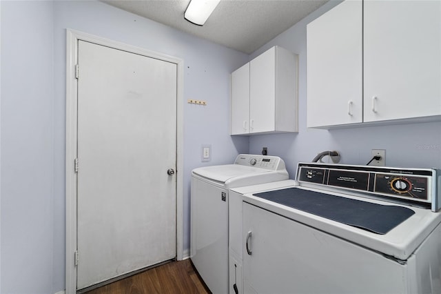 9001 SW 91st Cir, Ocala, FL 34481 - laundry area with independent washer and dryer, cabinet space, dark wood-style flooring, and a textured ceiling