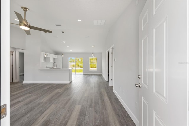 16697 SW 30 Avenue Rd, Ocala, FL 34473 - unfurnished living room featuring vaulted ceiling, ceiling fan, baseboards, dark wood finished floors, and recessed lighting