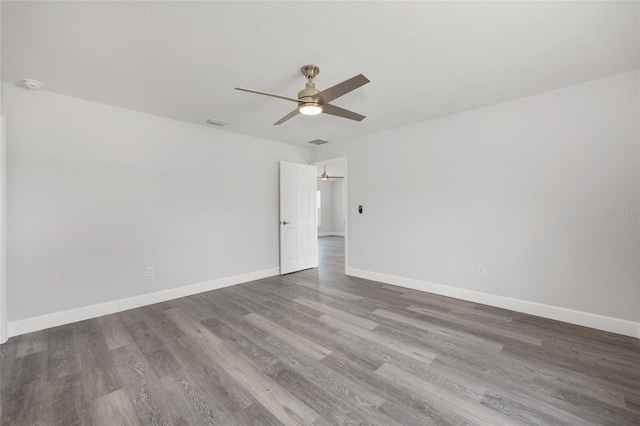 16697 SW 30 Avenue Rd, Ocala, FL 34473 - empty room featuring ceiling fan, wood finished floors, baseboards, and a smoke detector