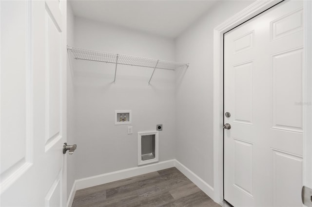 16697 SW 30 Avenue Rd, Ocala, FL 34473 - laundry room featuring dark wood finished floors, electric dryer hookup, washer hookup, and baseboards