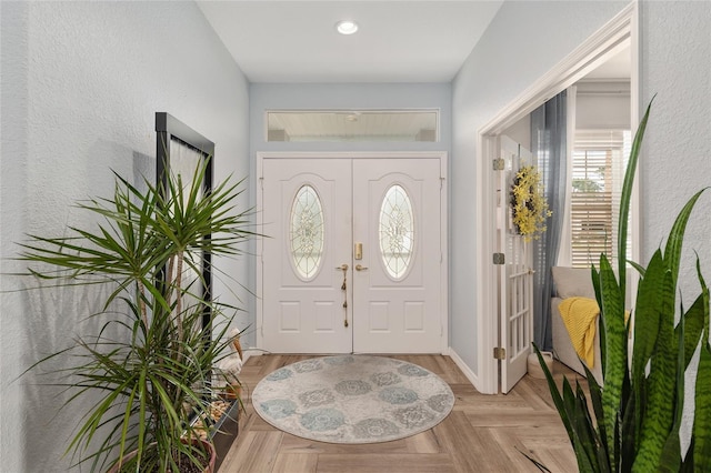 12804 SE 90th Court Rd, Summerfield, FL 34491 - foyer entrance featuring a textured wall, recessed lighting, and baseboards