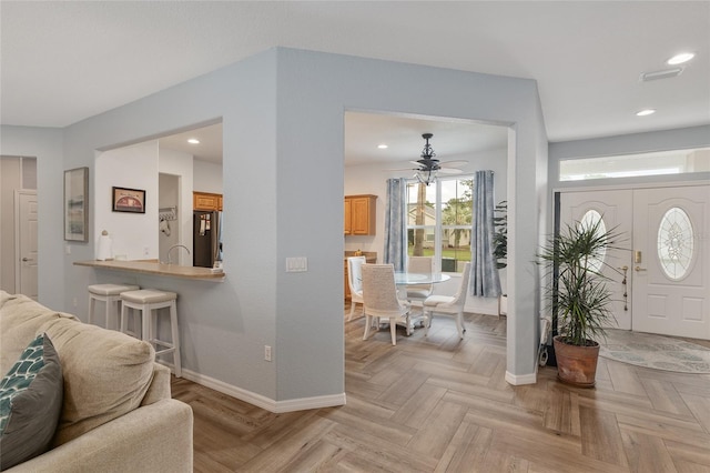 12804 SE 90th Court Rd, Summerfield, FL 34491 - foyer featuring baseboards, ceiling fan, and recessed lighting
