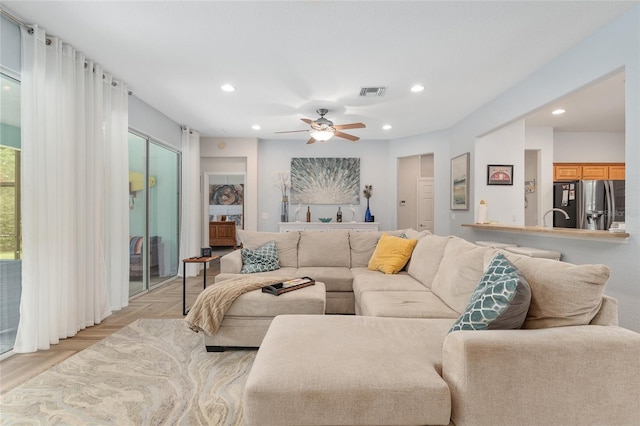 12804 SE 90th Court Rd, Summerfield, FL 34491 - living area featuring recessed lighting, a ceiling fan, and parquet floors