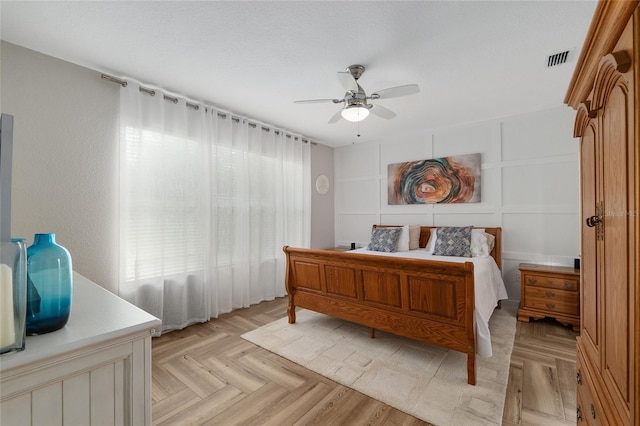 12804 SE 90th Court Rd, Summerfield, FL 34491 - bedroom with a ceiling fan