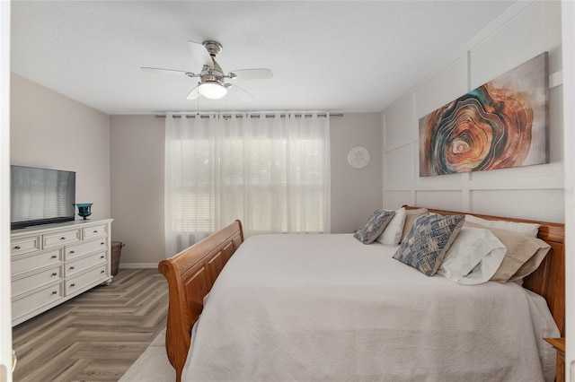12804 SE 90th Court Rd, Summerfield, FL 34491 - bedroom with a ceiling fan and a textured ceiling