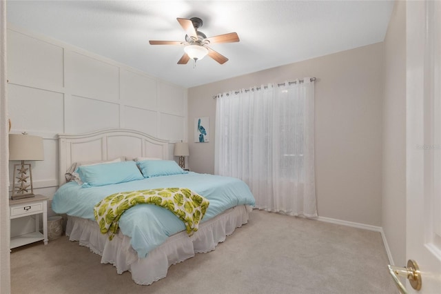 12804 SE 90th Court Rd, Summerfield, FL 34491 - bedroom with light carpet, ceiling fan, and baseboards