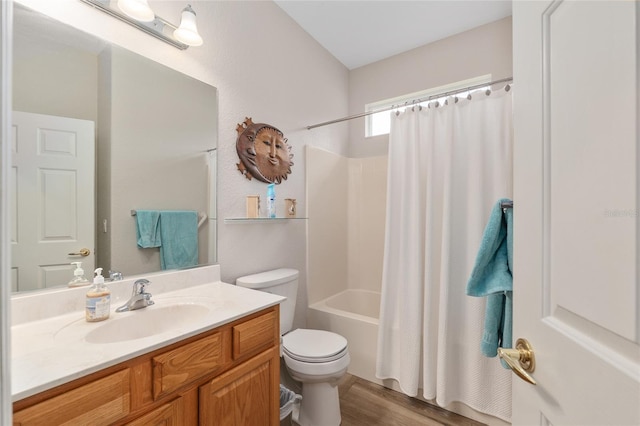 12804 SE 90th Court Rd, Summerfield, FL 34491 - full bathroom featuring vanity, toilet, shower / tub combo, and wood finished floors