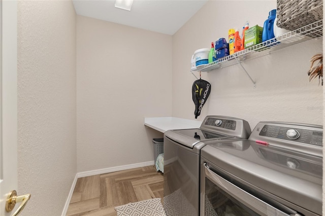 12804 SE 90th Court Rd, Summerfield, FL 34491 - laundry room featuring washer and dryer and baseboards