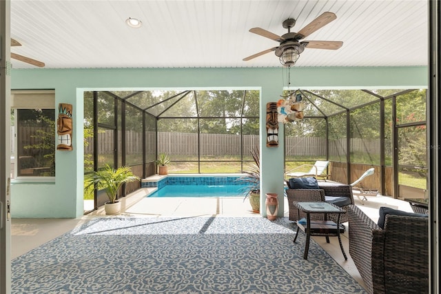 12804 SE 90th Court Rd, Summerfield, FL 34491 - view of swimming pool featuring a patio area, a fenced backyard, ceiling fan, an outdoor hangout area, and a lanai