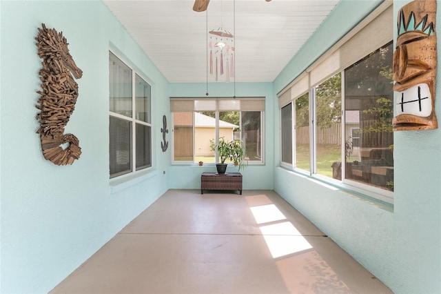 12804 SE 90th Court Rd, Summerfield, FL 34491 - unfurnished sunroom with concrete flooring