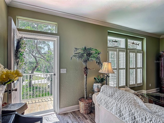 1575 S Wallace Pt Unit 23, Crystal River, FL 34429 - doorway to outside with ornamental molding, wood finished floors, baseboards, and a textured wall