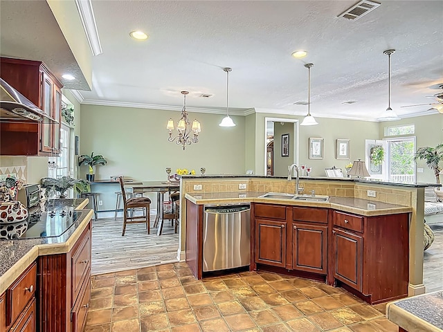 1575 S Wallace Pt Unit 23, Crystal River, FL 34429 - kitchen with dishwasher, a sink, crown molding, black electric cooktop, and pendant lighting
