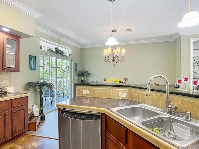 1575 S Wallace Pt Unit 23, Crystal River, FL 34429 - kitchen featuring dishwasher, a sink, ornamental molding, decorative backsplash, and hanging light fixtures