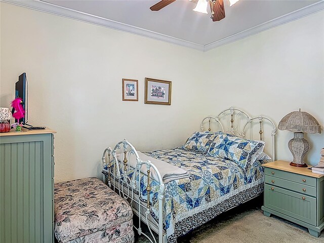 1575 S Wallace Pt Unit 23, Crystal River, FL 34429 - bedroom with crown molding, ceiling fan, and light colored carpet