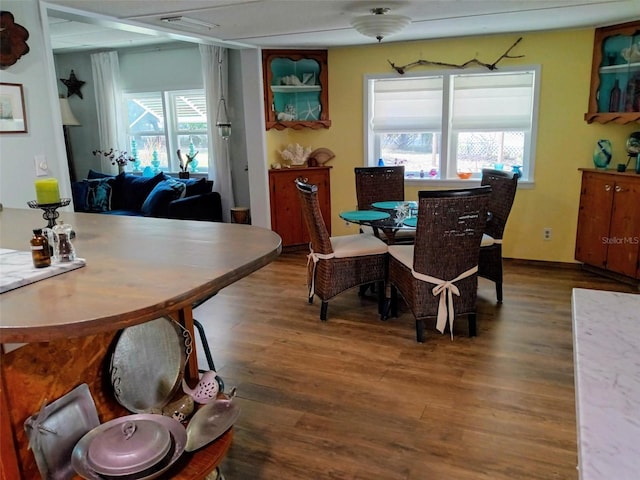 22736 SW 117th St, Dunnellon, FL 34431 - dining area with wood finished floors and healthy amount of natural light