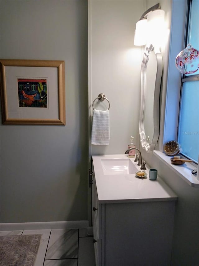 22736 SW 117th St, Dunnellon, FL 34431 - bathroom with vanity and baseboards
