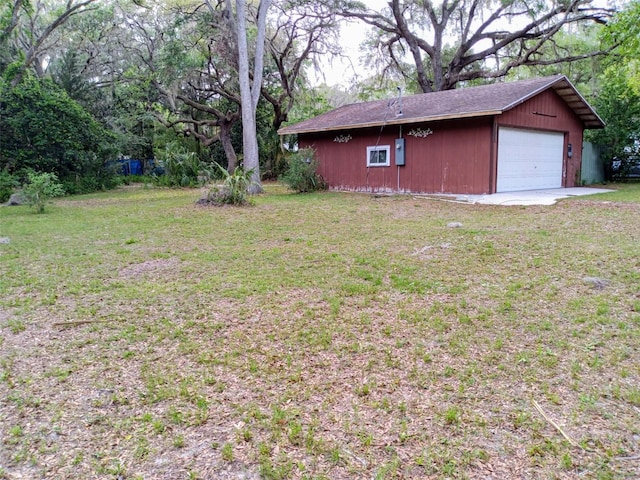 22736 SW 117th St, Dunnellon, FL 34431 - view of green lawn featuring a garage and an outdoor structure