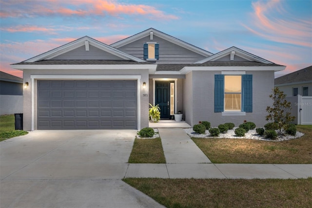 7571 SW 64th Street Rd, Ocala, FL 34474 - view of front of home with driveway and an attached garage