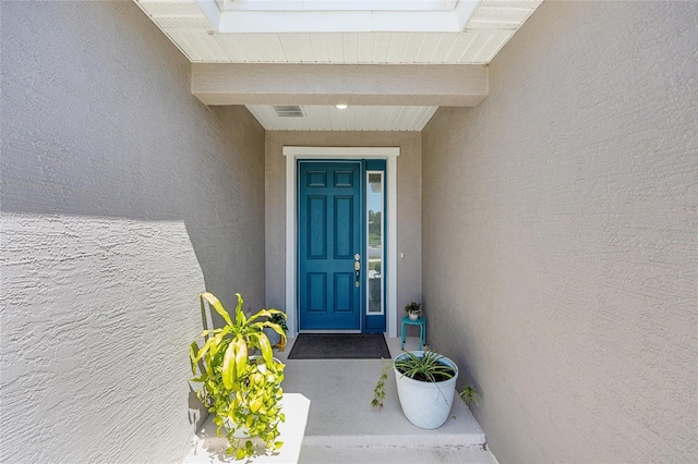 7571 SW 64th Street Rd, Ocala, FL 34474 - view of exterior entry featuring stucco siding