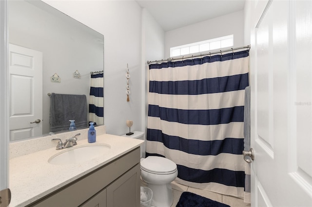 7571 SW 64th Street Rd, Ocala, FL 34474 - full bath featuring vanity, toilet, tile patterned floors, and a shower with shower curtain