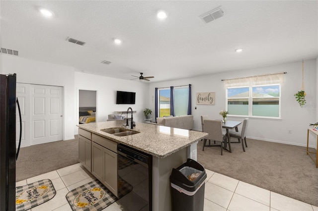 7571 SW 64th Street Rd, Ocala, FL 34474 - kitchen featuring light carpet, black appliances, a sink, a ceiling fan, and open floor plan