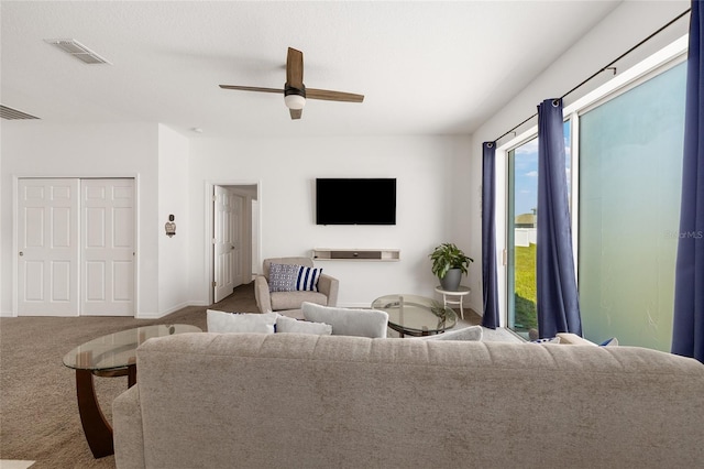 7571 SW 64th Street Rd, Ocala, FL 34474 - living area featuring carpet flooring, ceiling fan, and baseboards
