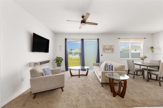 7571 SW 64th Street Rd, Ocala, FL 34474 - carpeted living area featuring plenty of natural light and ceiling fan