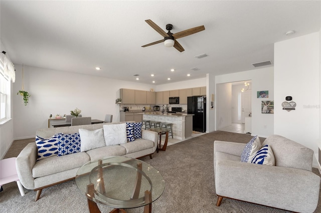 7571 SW 64th Street Rd, Ocala, FL 34474 - living area with a ceiling fan, light colored carpet, recessed lighting, and baseboards