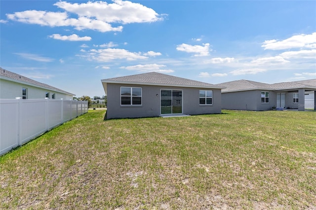 7571 SW 64th Street Rd, Ocala, FL 34474 - rear view of property with stucco siding
