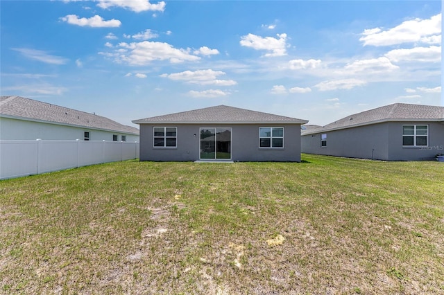 7571 SW 64th Street Rd, Ocala, FL 34474 - rear view of house featuring stucco siding
